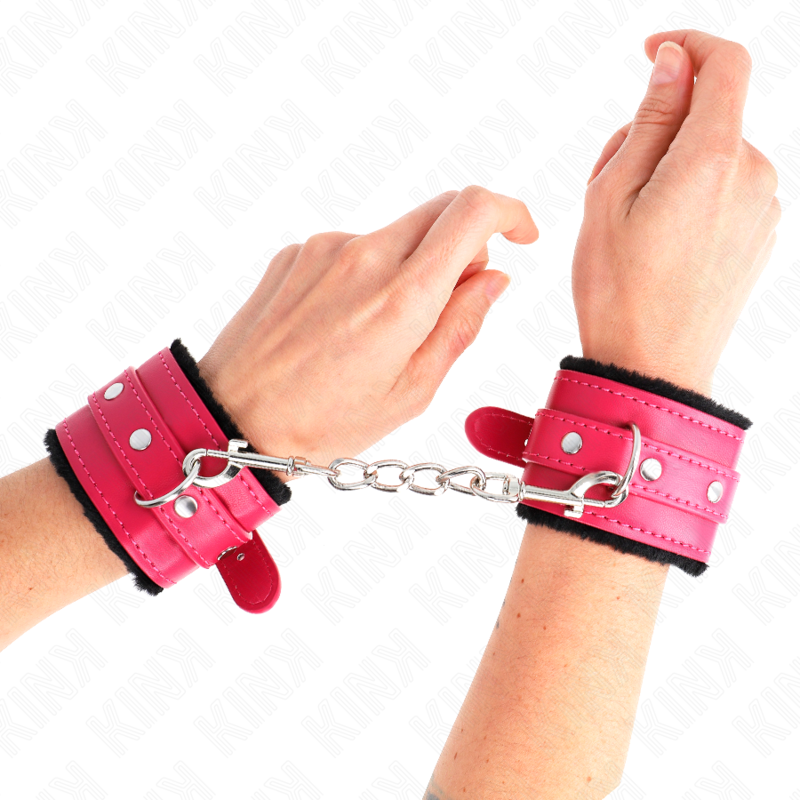 Kink - Poggipolsi Premium Foderati In Pelliccia Neri Con Cintura Rosa Lampone Regolabile 17-29 Cm X 6 Cm - KINK WRIST RESTRAINT - Manette e Polsini | erosidea.com